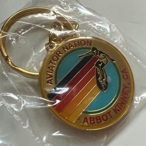 BRAND NEW, rare Aviator Nation keychain!